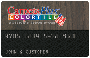 A carpets plus color tile store branded credit card with financing options and a partially visible card number on a textured black background.