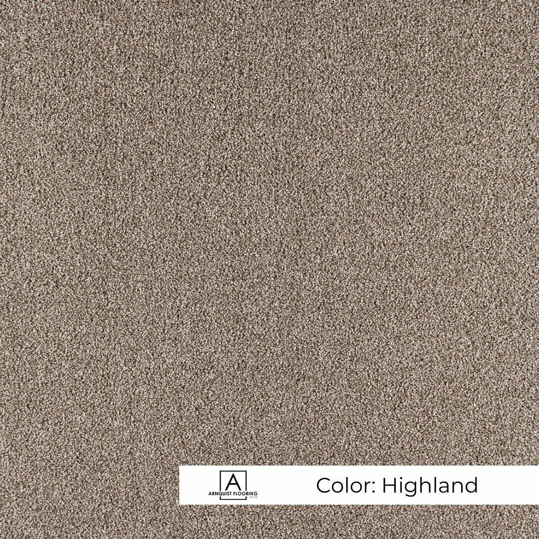 Close-up of a textured carpet swatch in a neutral tone inspired by the 'highland' landscape.